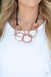 Spiraling Out of COUTURE - Brass